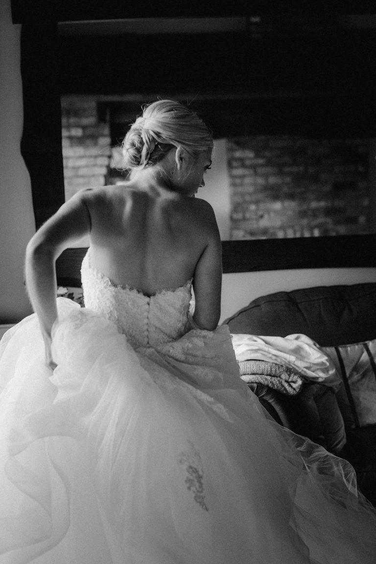 black and white image of bride in her pronovias dress